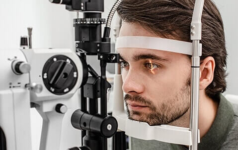 Young man having eye exam