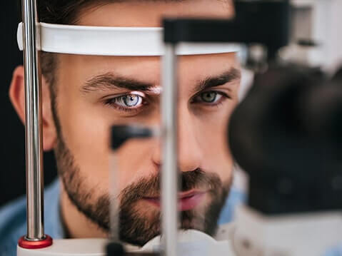 Man having his eye examined