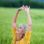 lady celebrating dropless cataract surgery 